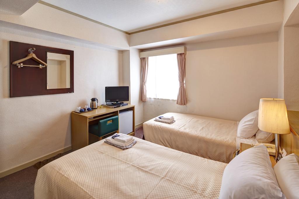 Okinawa Sun Plaza Hotel Наха Экстерьер фото